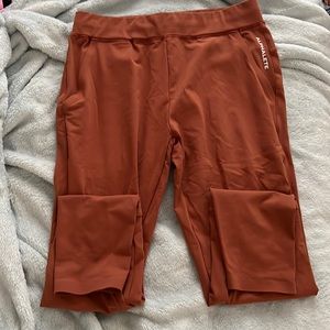 Alphalete joggers, size large, never worn, burnt orange